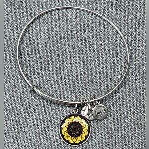 Alex and Ani silver tone bangle bracelet with a colorful sunflower charm.